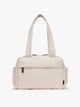 CALPAK Mini Duffel in white Oatmeal front view with puffy exterior, interior and exterior pockets, and padded shoulder straps; DLM2501-OATMEAL