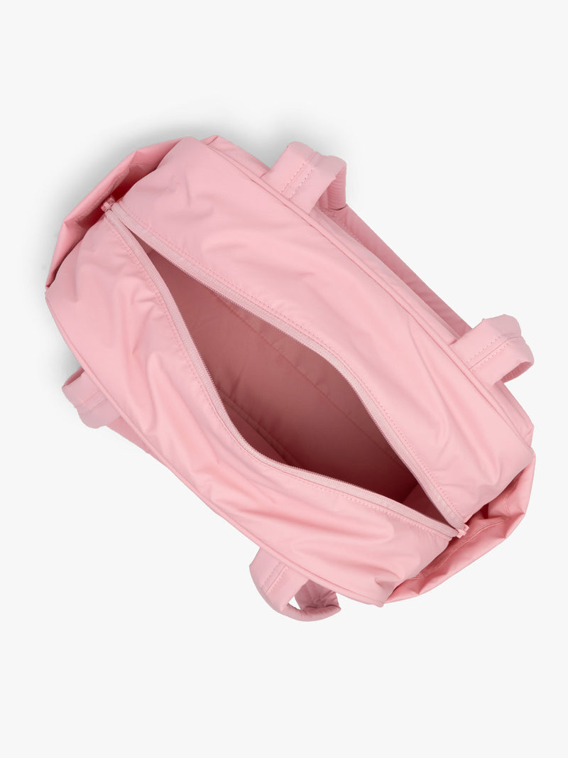 CALPAK Luka Mini Duffel in pink Blossom opened
