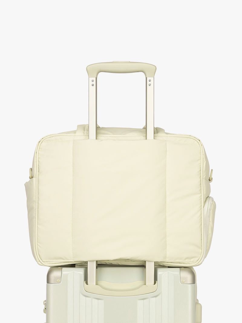Luggage trolley sleeve of CALPAK Luka Duffel in light green Celadon