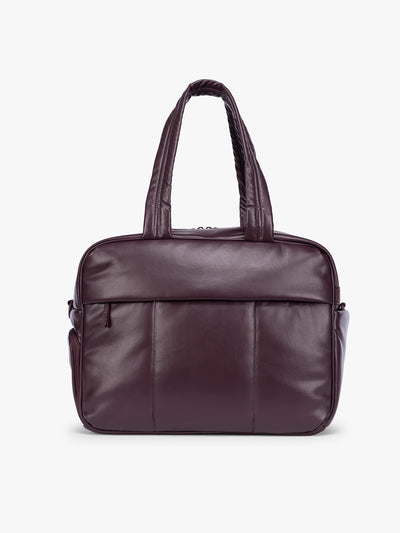 A dark burgundy CALPAK Luka Duffel in vegan leather with dual top handles and a front zippered pocket, photographed against a clean white background; DSM1901-DARK-CHERRY-PU view 1