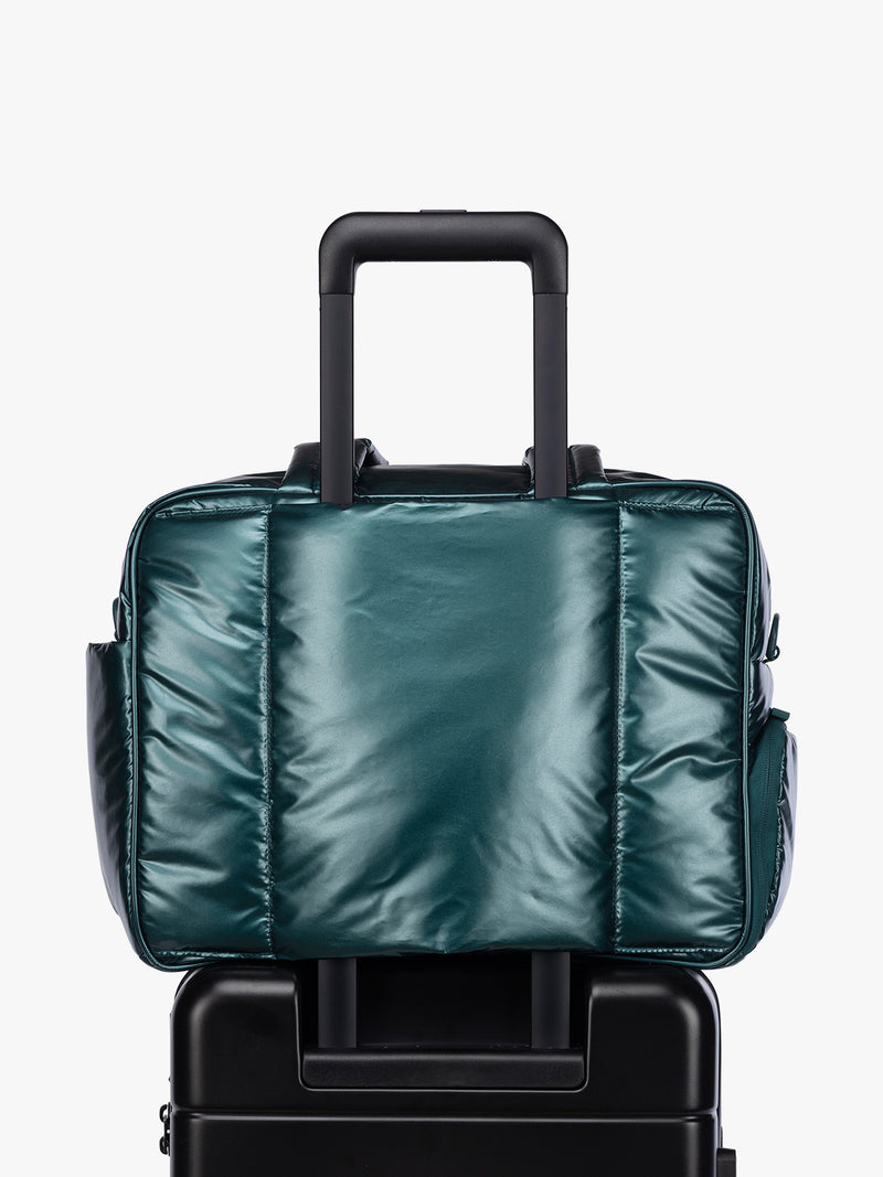 Luggage trolley sleeve of CALPAK  Luka Duffel in dark green shiny Glazed Kale