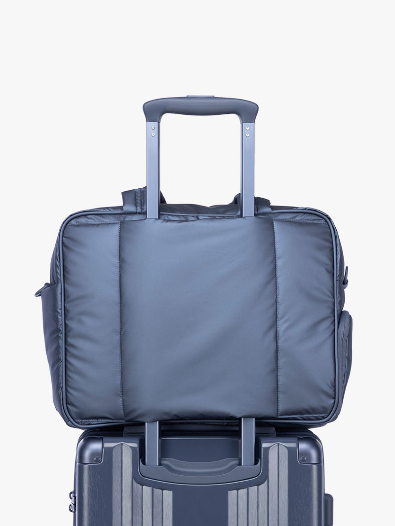 Luggage trolley sleeve of CALPAK Luka Duffel in metallic dark blue material Metallic Indigo