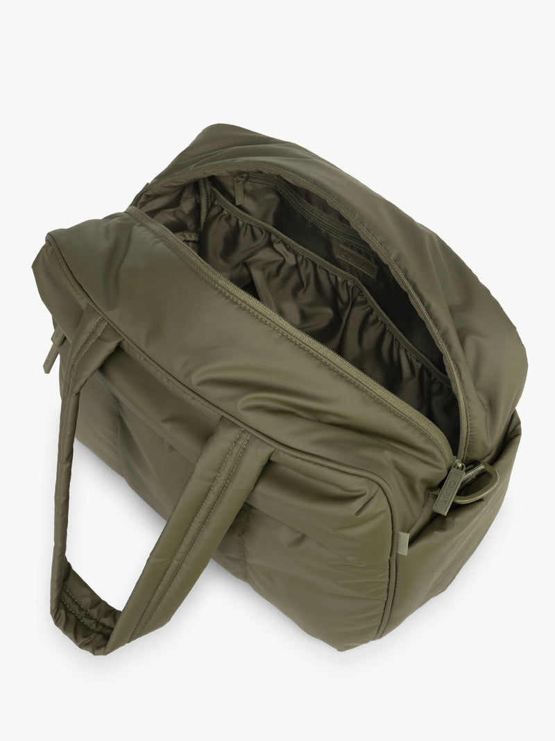 CALPAK Luka Duffel in dark green Pine opened