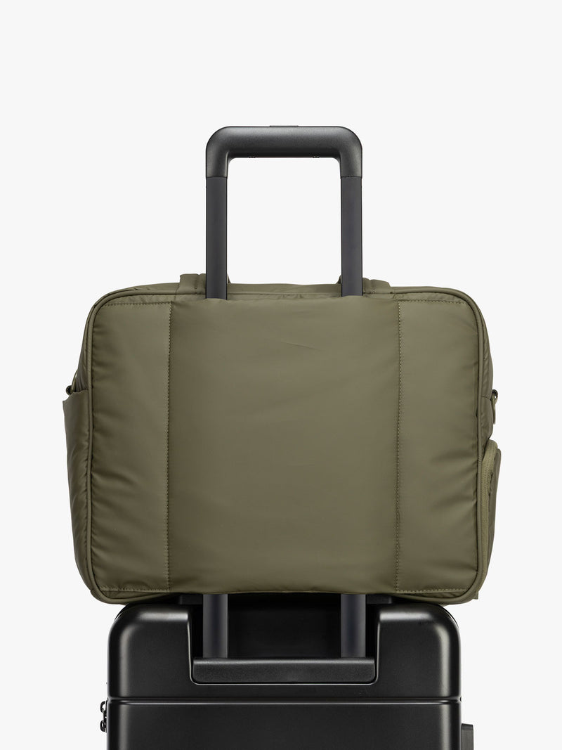 CALPAK Luka Duffel in dark green Pine luggage trolley sleeve