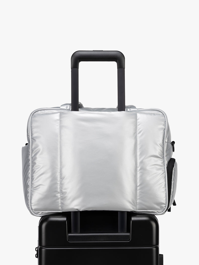 CALPAK Silver Luka Duffel luggage trolley sleeve view a white background