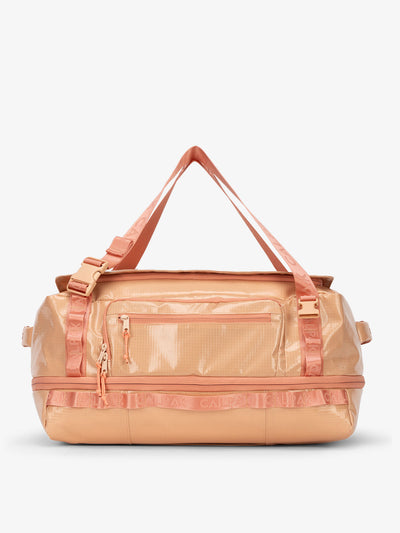 CALPAK Terra 50L Duffel Backpack in salmon color Canyon; DTL2301-CANYON view 1