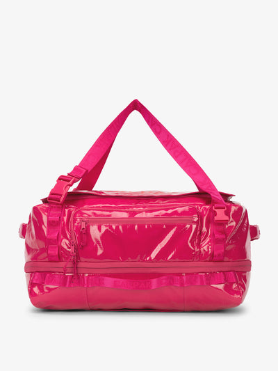 CALPAK Terra 50L Duffel Backpack in bright pink Dragonfruit; DTL2301-DRAGONFRUIT view 1