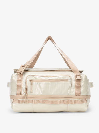 CALPAK Terra 50L Duffel Backpack in off-white beige White Sands; DTL2301-WHITE-SANDS view 1