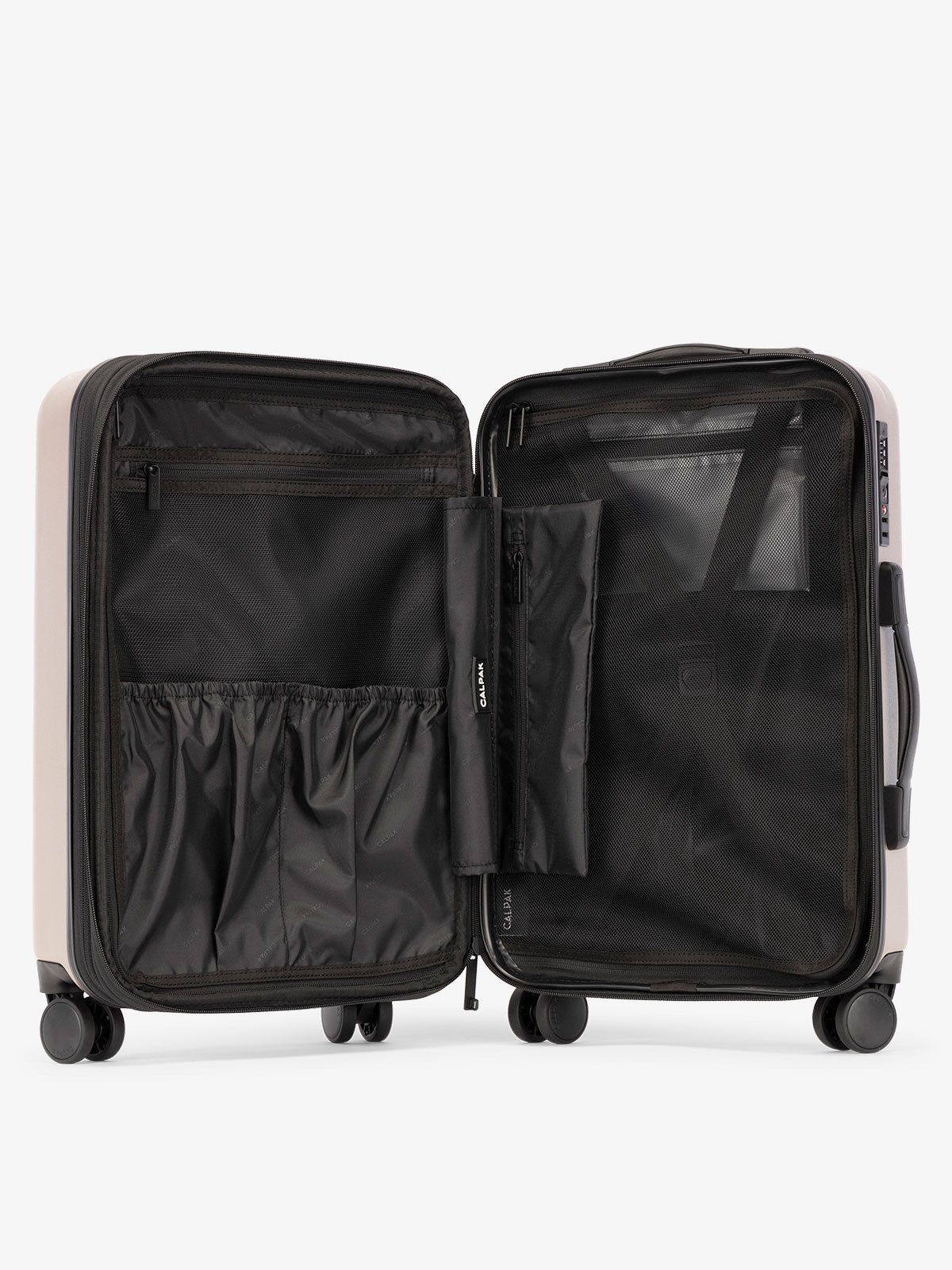 CALPAK Evry Carry-On Luggage features divided compartments with interior pockets for organized packing in brown chocolate