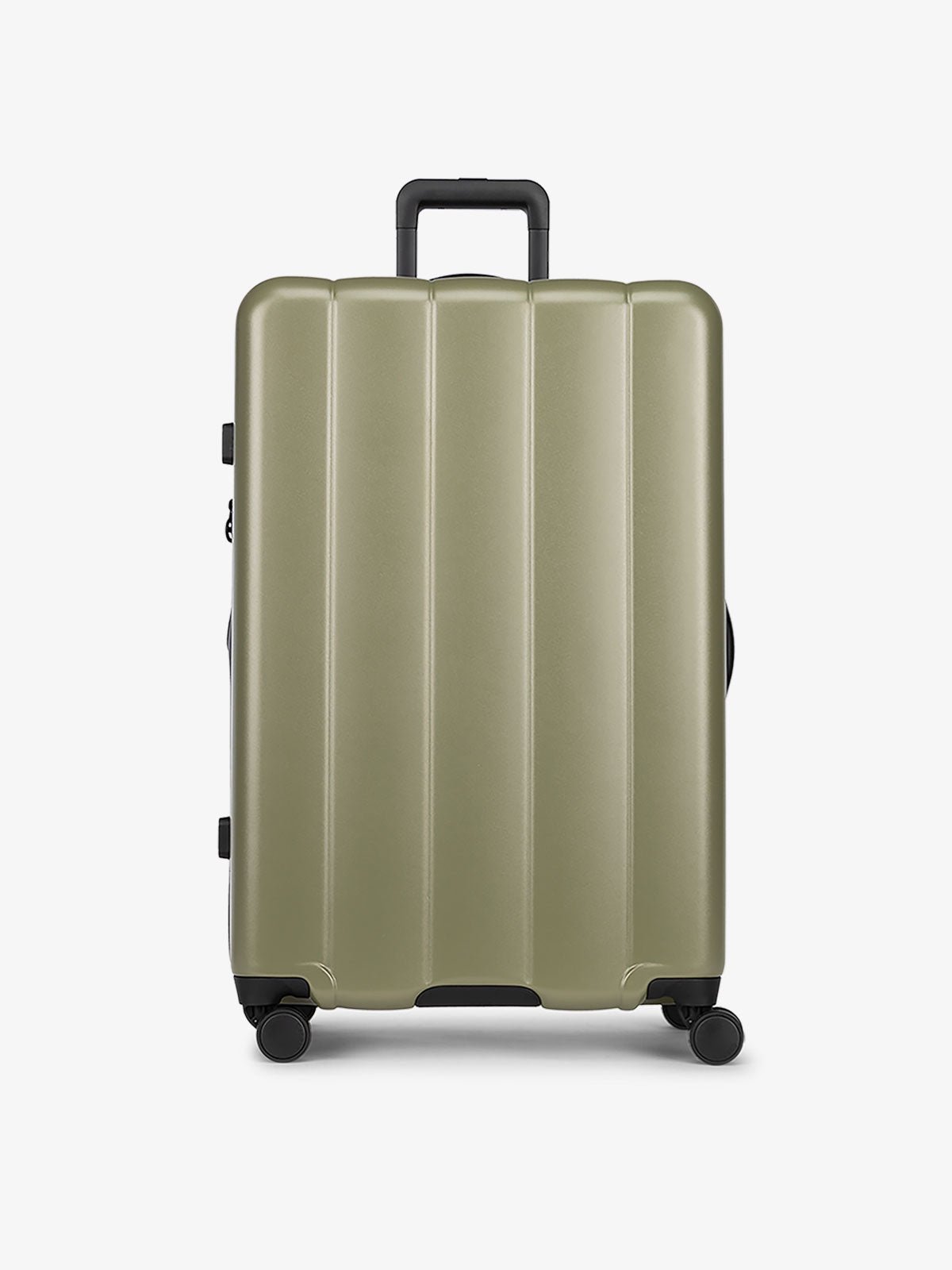 Pistachio green large luggage made from an ultra-durable polycarbonate shell and expandable by up to 2"