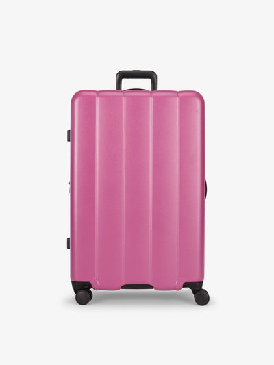 CALPAK raspberry large luggage made from an ultra-durable polycarbonate shell and expandable by up to 2; LCO1028-RASPBERRY view 1