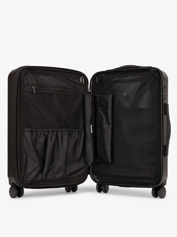 CALPAK Evry Large Luggage features divided compartments with interior pockets for organized packing