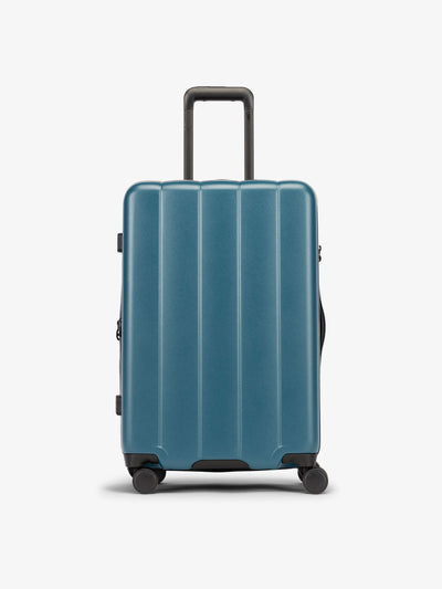 CALPAK Pacific blue medium luggage made from an ultra-durable polycarbonate shell and expandable by up to 2