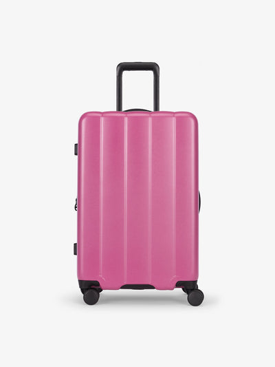CALPAK raspberry medium luggage made from an ultra-durable polycarbonate shell and expandable by up to 2; LCO1024-RASPBERRY view 1