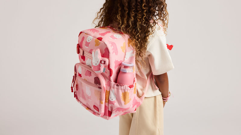 CALPAK + MIFFY Kids Medium Backpack in Pink Zoo Trip with side water bottle pocket