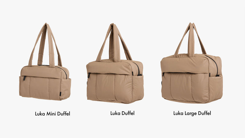 Three sizes of CALPAK Luka Duffel Bags (Mini Duffel, regular Luka Duffel, and Large Duffel) in brown Chocolate on a white background