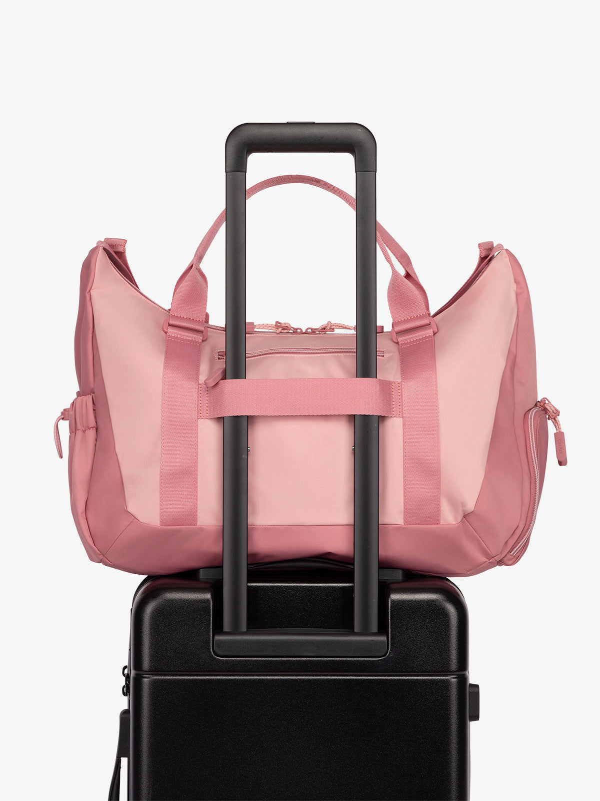 CALPAK Fit gym duffel bag with luggage trolley sleeve in tea rose pink; TBF2401-TEA-ROSE, TBF2401-TEA-ROSE-GRIN, BTBF2401-TEA-ROSE