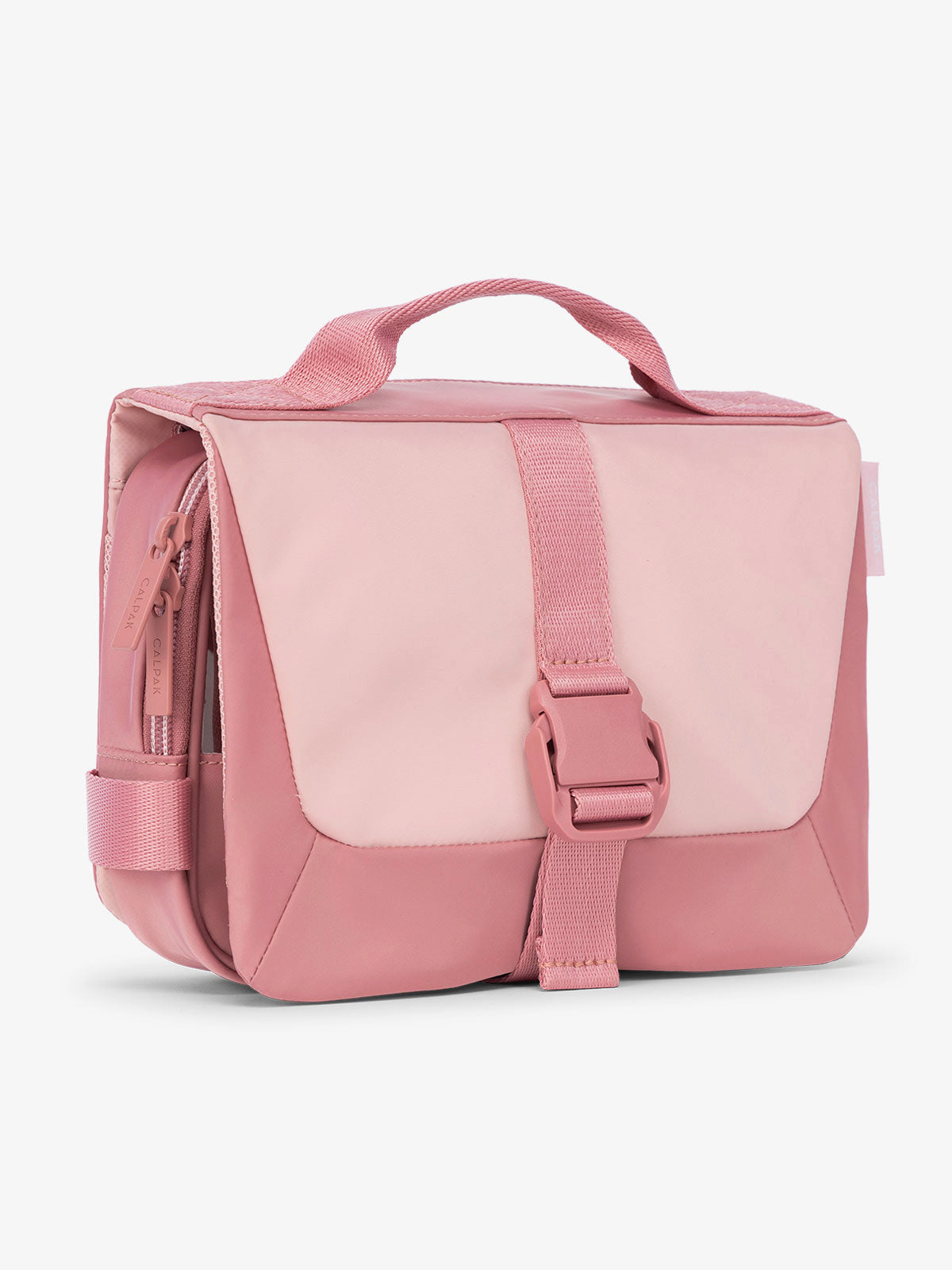 Side view of CALPAK Fit gym toiletry bag with durable carrying handle and made with 2 recycled water bottles in tea rose pink; TFH2401-TEA-ROSE, TFH2401-TEA-ROSE-GRIN, BTBF2401-TEA-ROSE