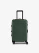 CALPAK Hue Carry-On Luggage front view in hard shell in green emerald; LHU1020-NP-EMERALD