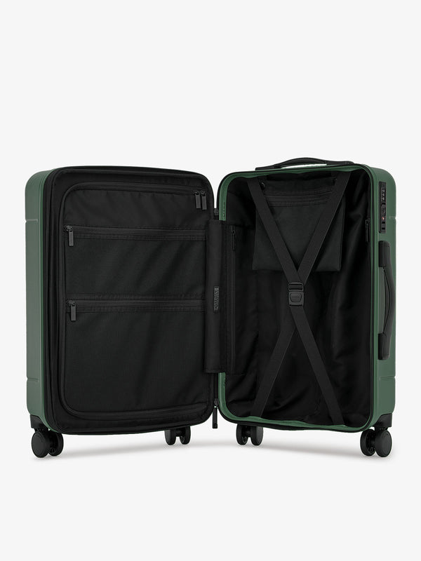 CALPAK Interior of Hue rolling carry-on suitcase in emerald green