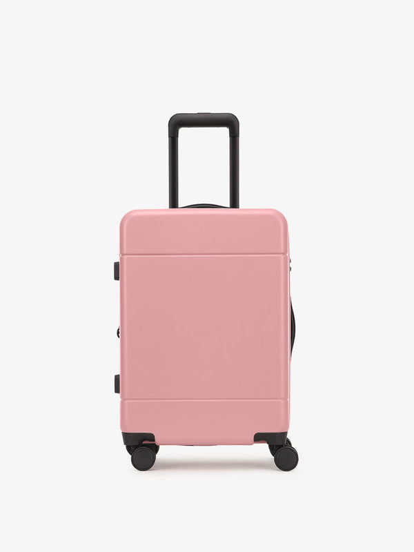 CALPAK Hue hard shell rolling carry on luggage in light pink mauve