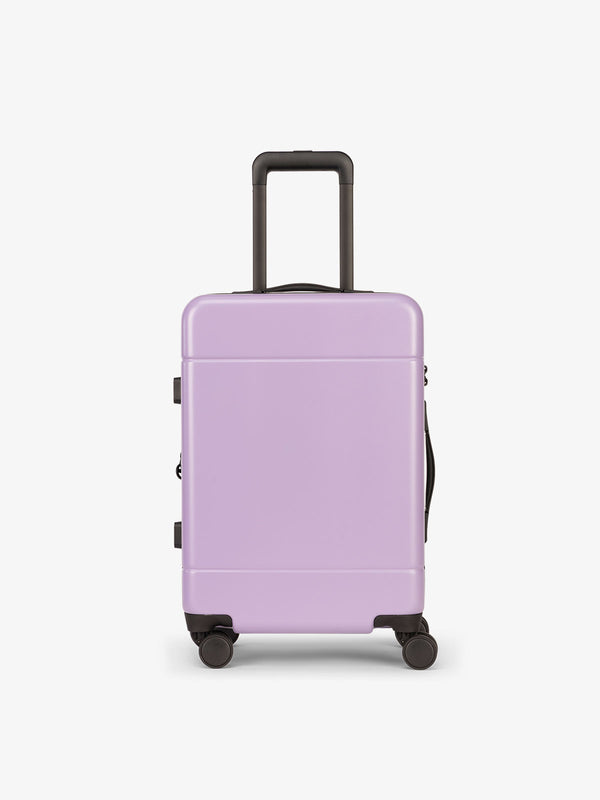 Hue hard shell rolling carry on luggage in orchid purple