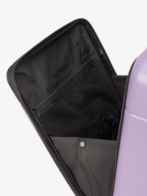 CALPAK front pocket compartment of carry-on hardshell luggage in purple