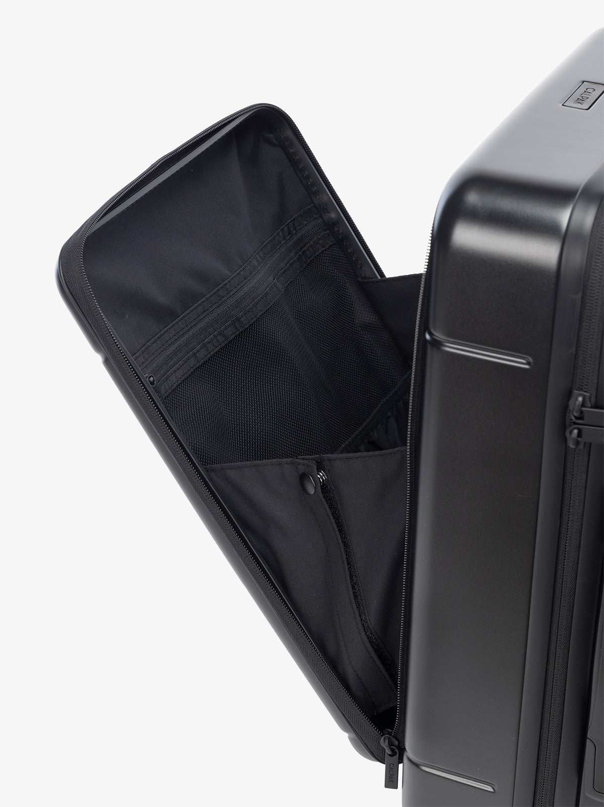 the laptop compartment of CALPAK Hue carry-on suitcase in black color; LHU1020-BLACK