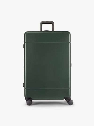 CALPAK Hue Large 30 inch hard shell Luggage front view in green Emerald; LHU1028-EMERALD
