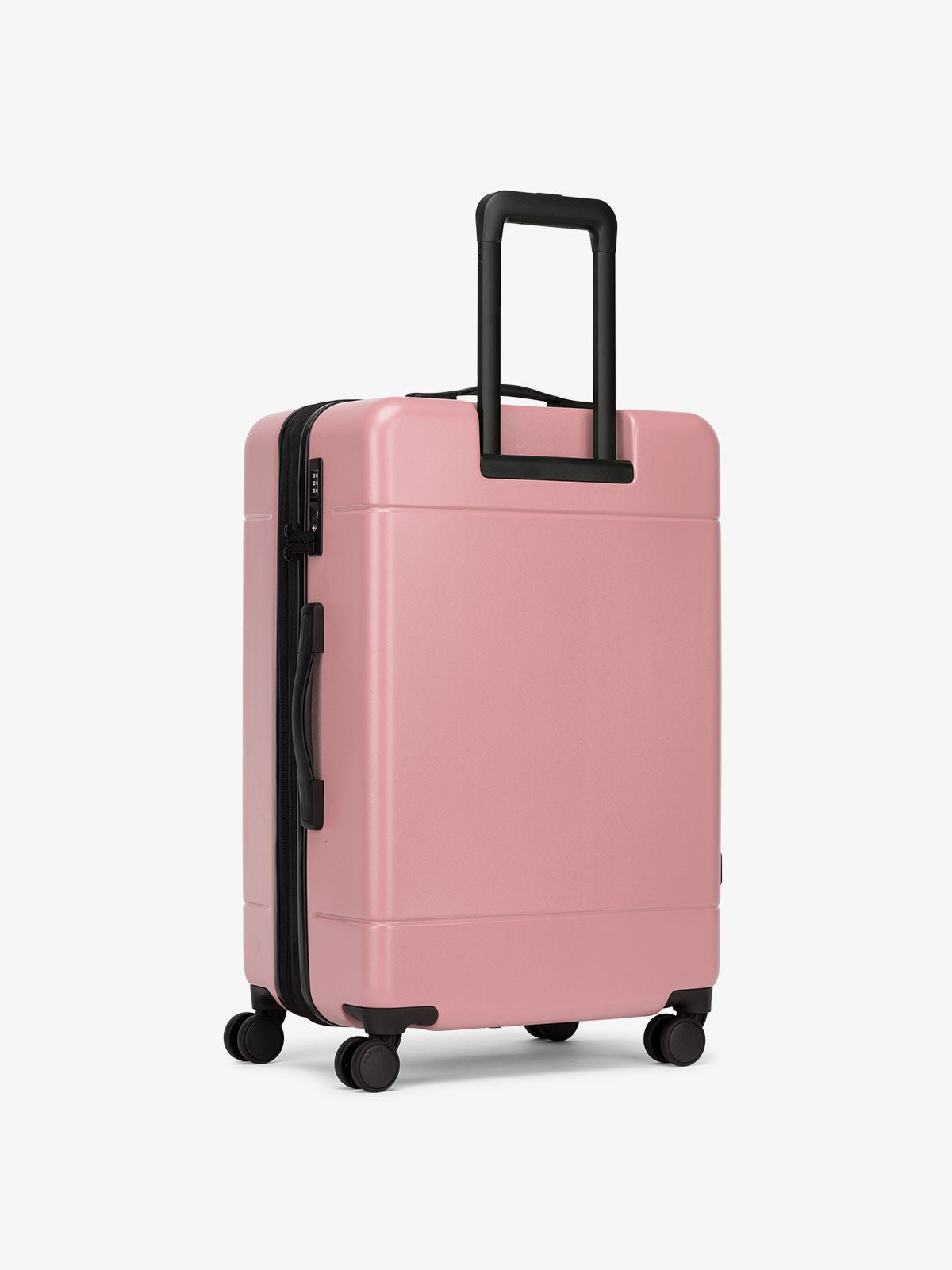 Light pink mauve hue rolling polycarbonate suitcase