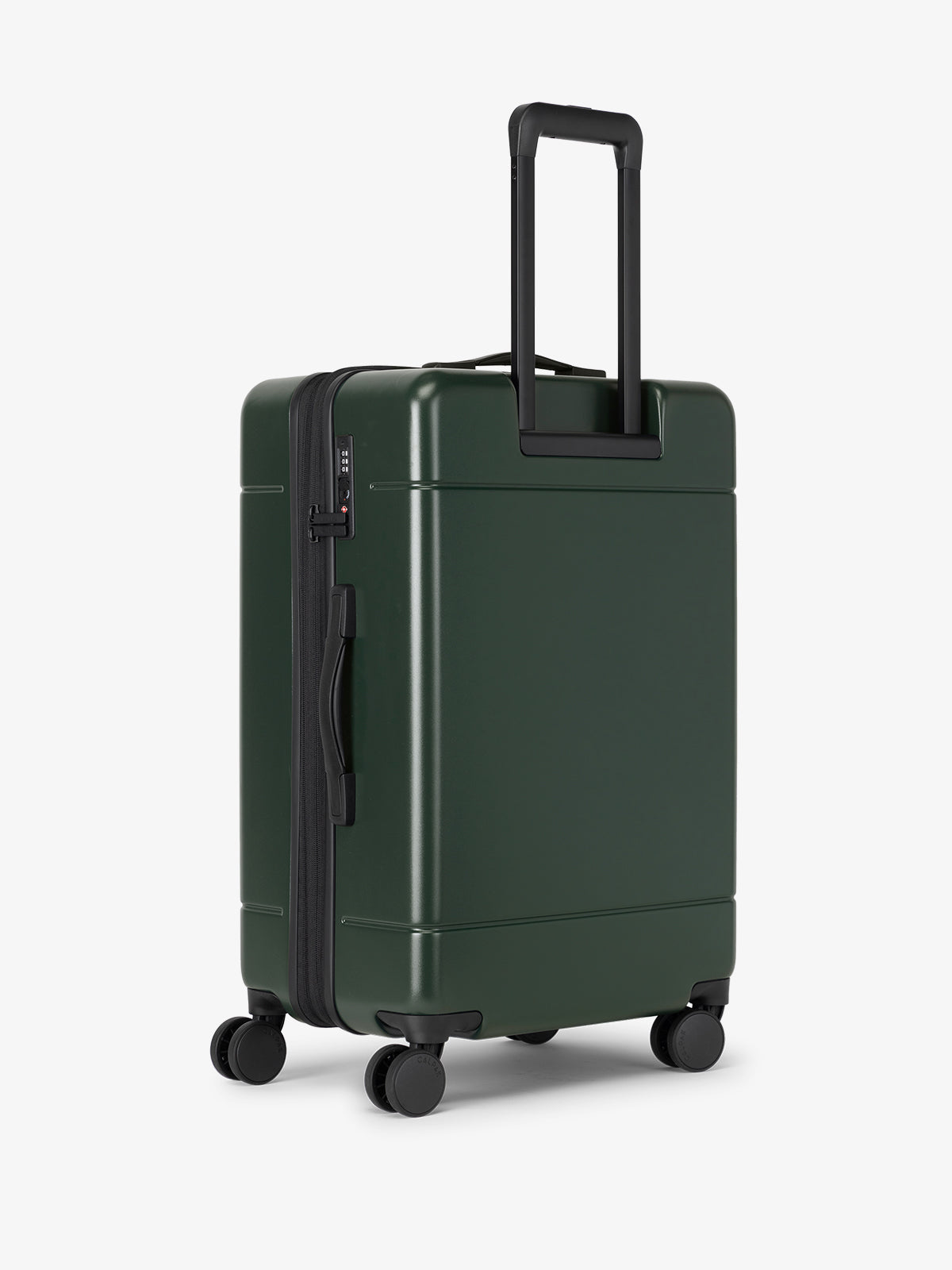 CALPAK Hue Medium 26 inch hardside Luggage back view in green Emerald; LHU1024-EMERALD