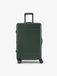 CALPAK Hue Medium 26 inch hardside Luggage front view in green Emerald; LHU1024-EMERALD