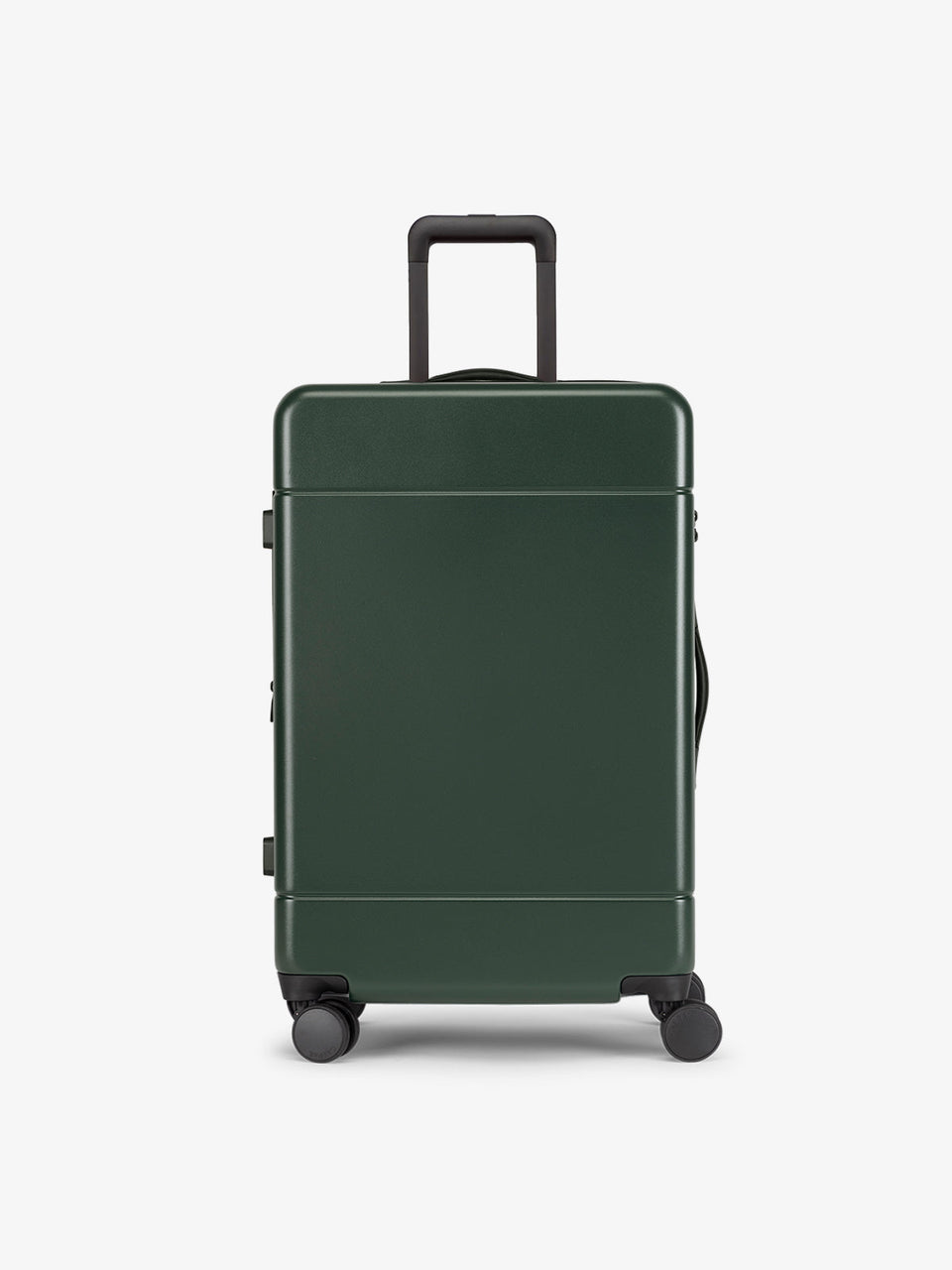 CALPAK Hue Medium 26 inch hardside Luggage front view in green Emerald; LHU1024-EMERALD