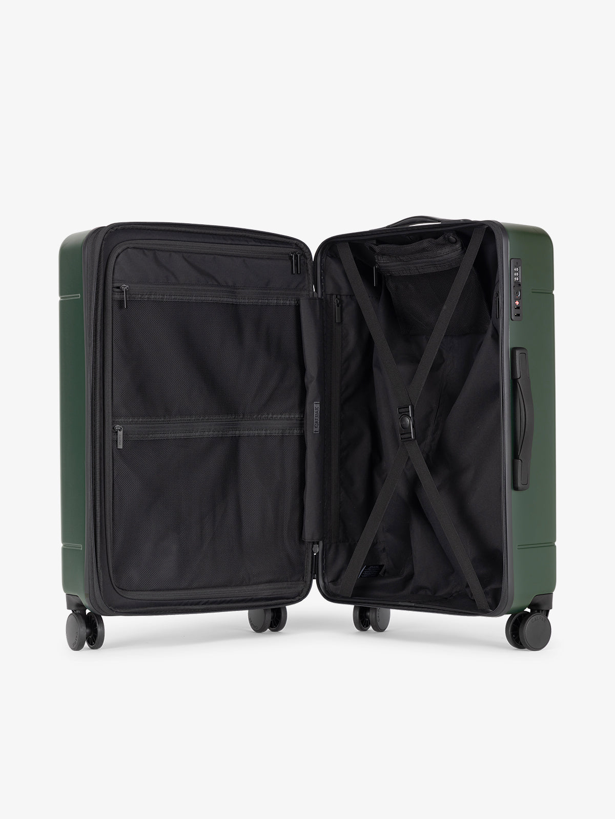 CALPAK Hue Medium 26 inch hardside Luggage opened interior in green Emerald; LHU1024-EMERALD