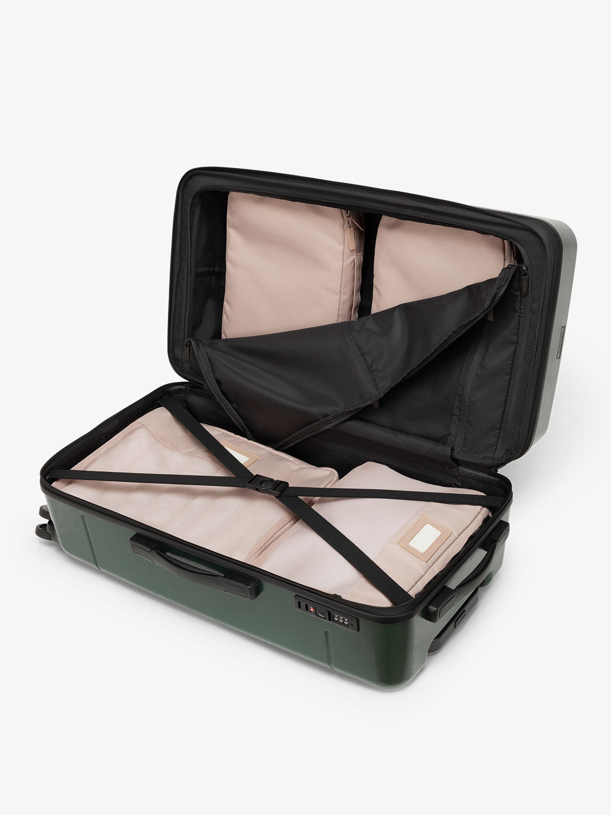 CALPAK Hue medium trunk suitcase with spacious interior and zippered divider with pockets in emerald green; LHU1026-EMERALD