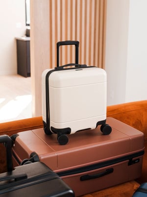 white mini carry on suitcase for travel 