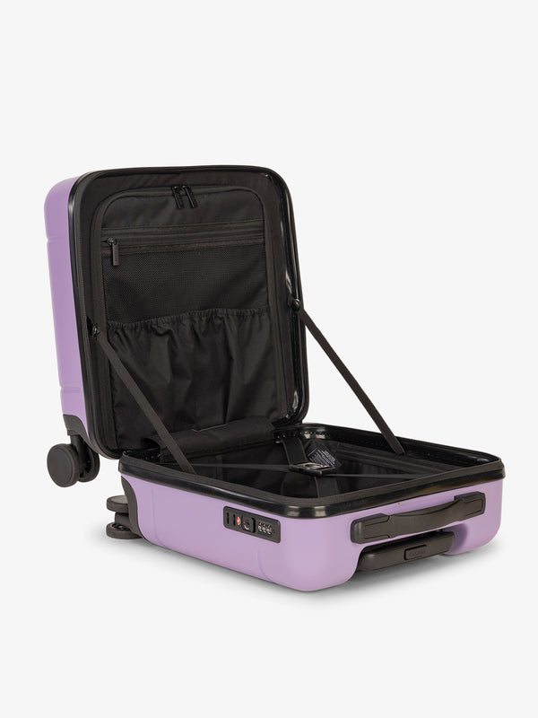 Hue small carry-on featuring compression straps in purple orchid