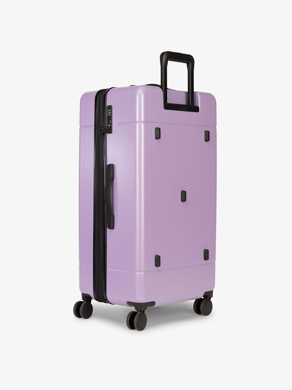 hue hard side polycarbonate trunk luggage in orchid purple