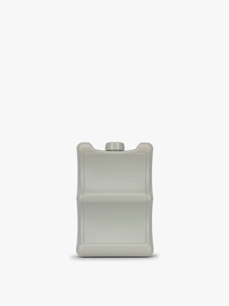 Ice pack that comes with the CALPAK Insulated Baby Bottle Bag in blue navy