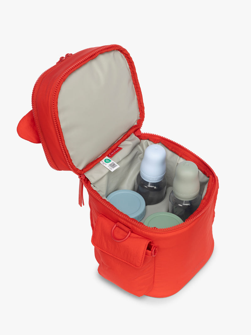 Bottom compartment with baby bottles in the CALPAK Insulated Baby Bottle Bag in red Tomato