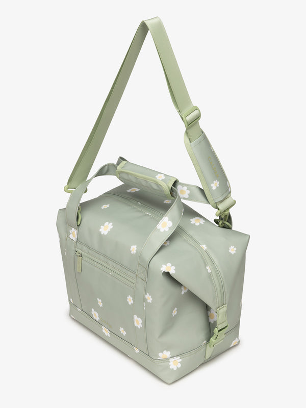CALPAK Insulated 17L Soft-Sided Cooler with removable, adjustable crossbody strap in daisy green print
