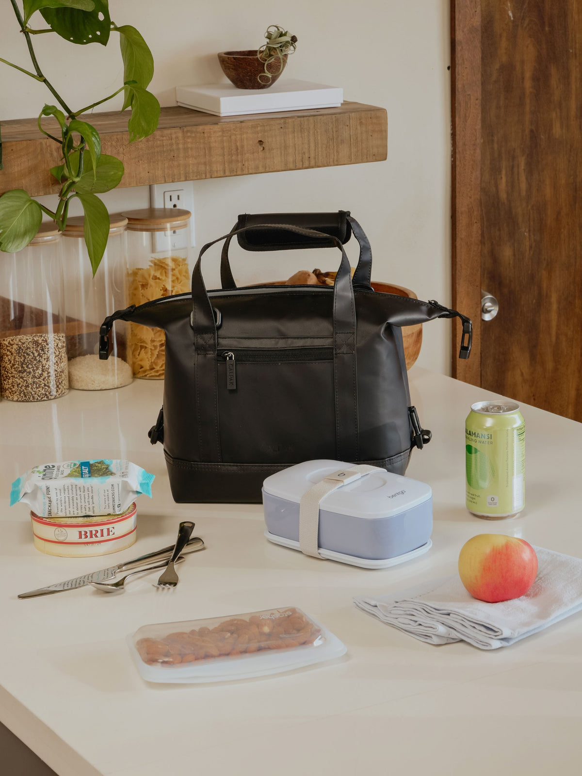 CALPAK Insulated 8L Soft-Sided Cooler on table in black; ISCS2401-BLACK