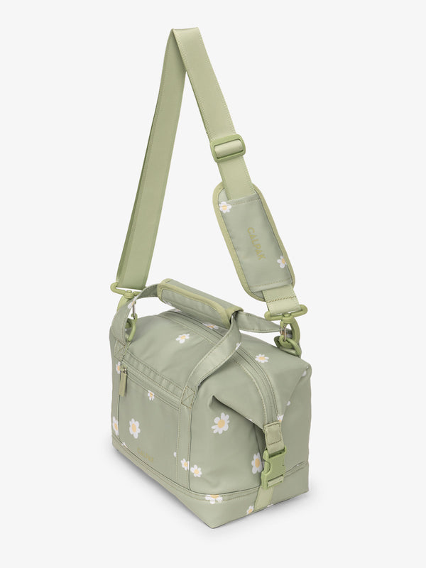 CALPAK Insulated 8L Soft-Sided Cooler with removable, adjustable crossbody strap in green floral print