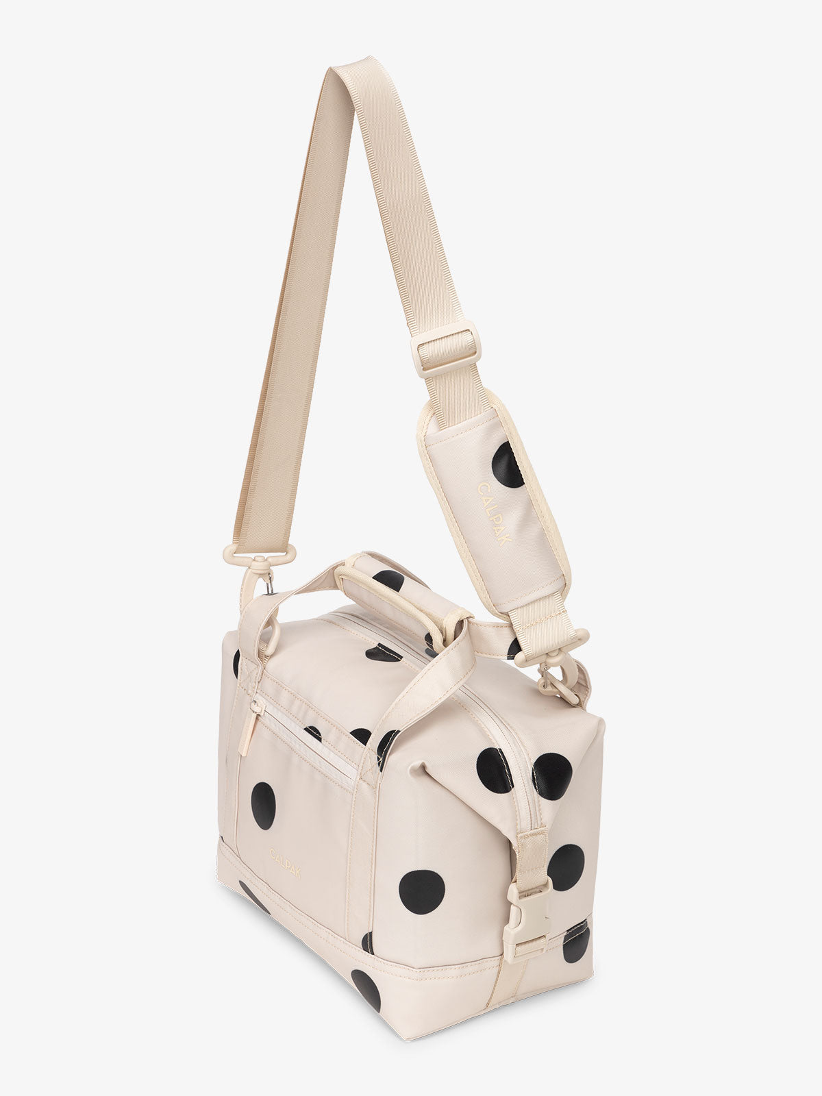 CALPAK Insulated 8L Soft-Sided Cooler with removable, adjustable crossbody strap in black and white polka dot; ISCS2401-POLKA-DOT