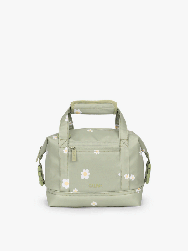 CALPAK 8L insulated cooler bag with durable TPU coated exterior material and side buckles that allow for expansion in green daisy print