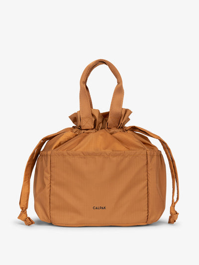 CALPAK lunch bag in brown; ALB2001-CAMEL