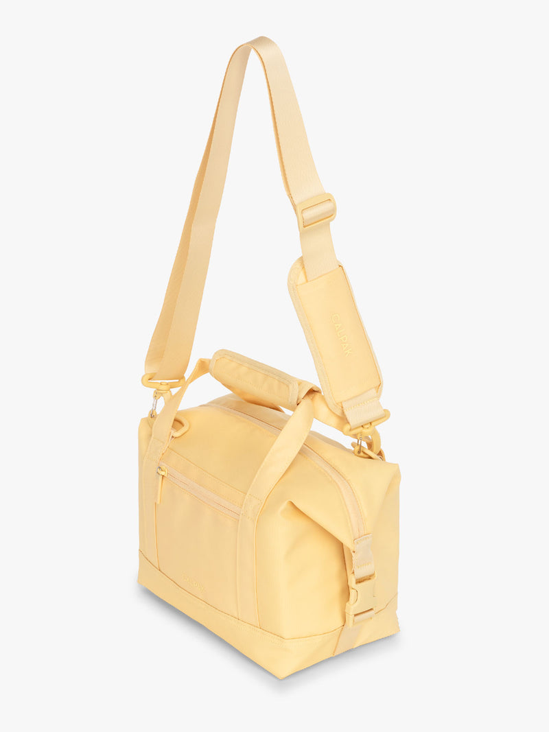 CALPAK Insulated 8L Soft-Sided Cooler with removable, adjustable crossbody strap in yellow Lemonade