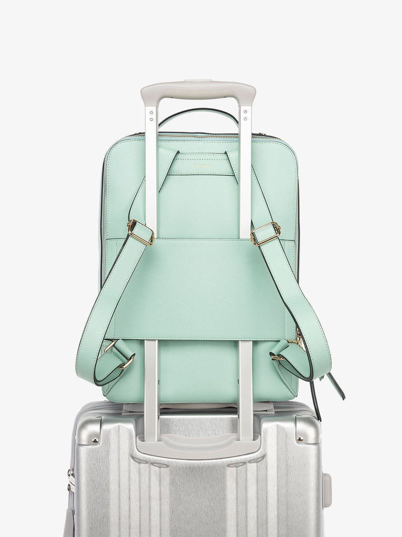 CALPAK Kaya Laptop Backpack for travel with luggage sleeve and adjustable straps in light blue