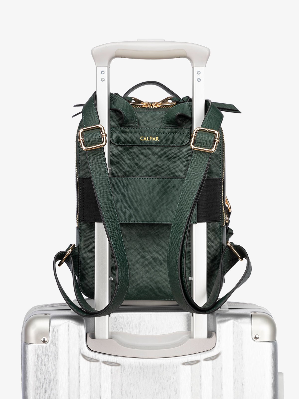 CALPAK Kaya Mini Backpack with luggage trolley and adjustable straps in green