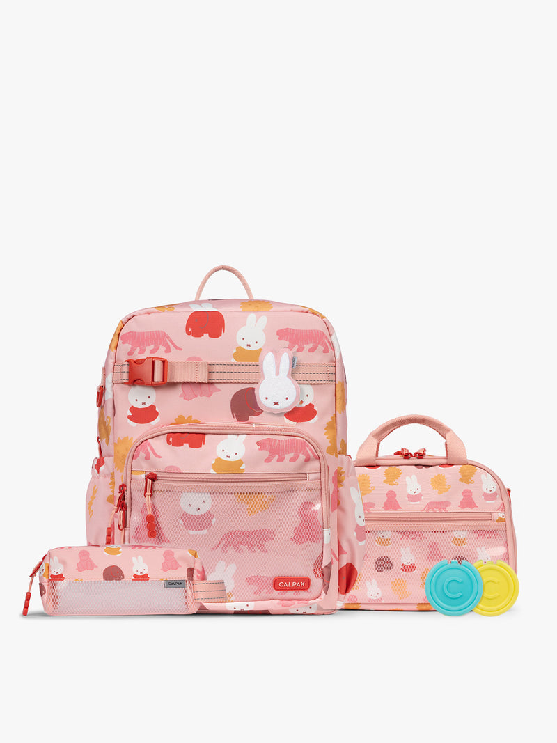 Colorful CALPAK + Miffy Kids Essentials Set with children's Large backpack, lunch bag , pencil case set on a white background with pink accents and Miffy with other animals